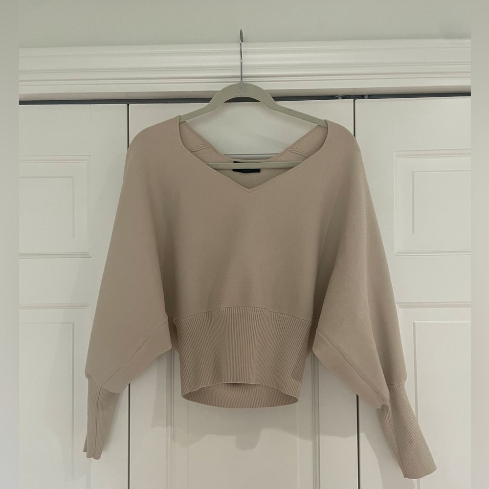 Express V-neck beige banded bottom long sleeve sweater. Size small